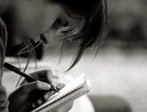 Girl Writing in Notebook, Black and White Image