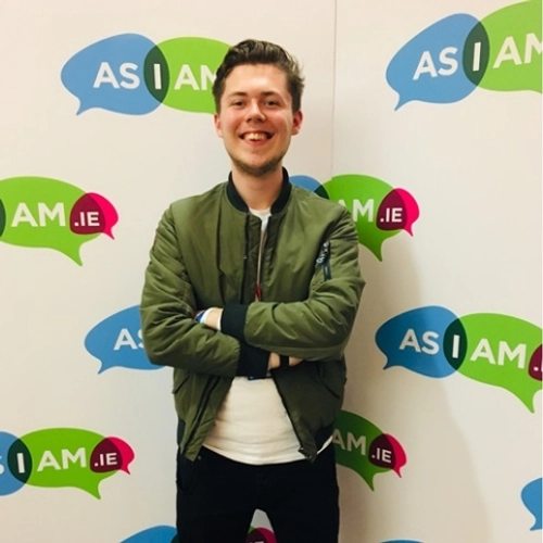 TCD student Ben Rowsome Standing Infront of As I am Wallpaper