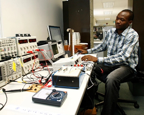 Person working in a computer science lab
