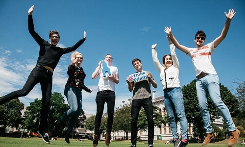 Friends jumping in the air