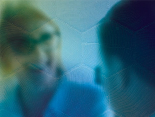 graphic with two figures conversing and the campanile to the left