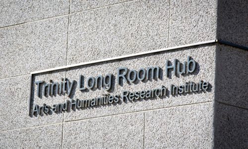 Signage reading 'Trinity Long Room Hub: Arts and Humanities Research Institute'.