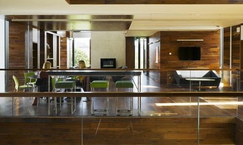 Two people seated in the Long Room Hub Ideas Space.