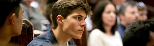 A student paying attention in a lecture.