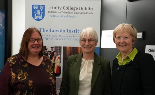 One scholarship attendees and two Loyola personnel