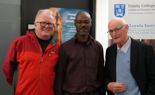 One scholarship attendee and two Loyola personnel