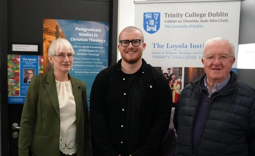 One scholarship attendee and two Loyola personnel