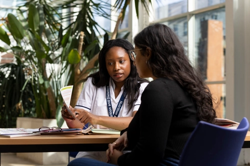 Dietitian with patient