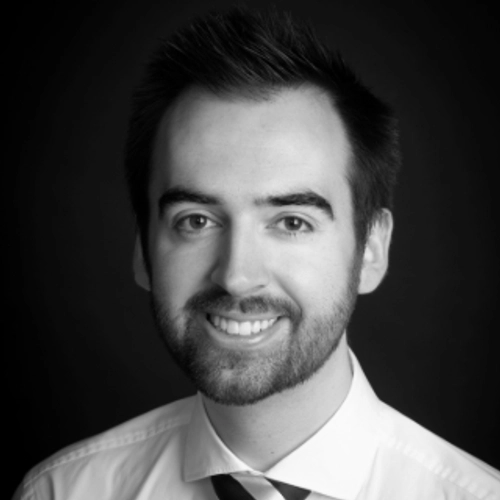 A headshot of Donal Wallace