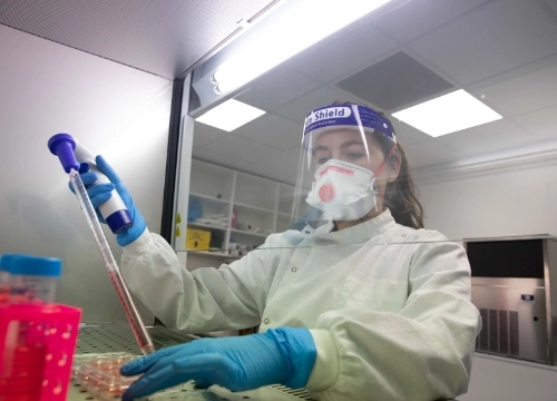 Student working in lab, Trinity College Dublin.