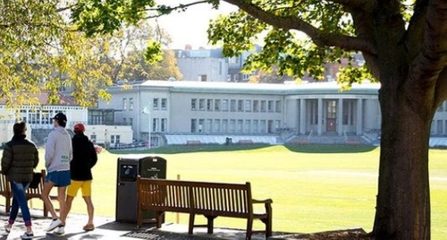 Moyne Institute on Sunny Day with students walking by