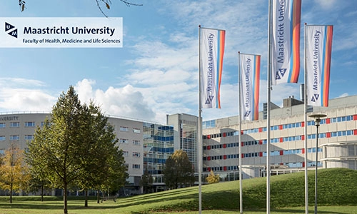 View of campus buildings and flags of the University of Maastricht