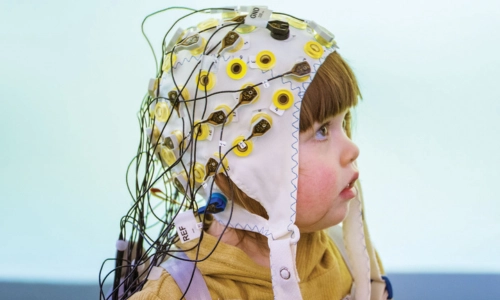 Child having brain-blood flow scanned