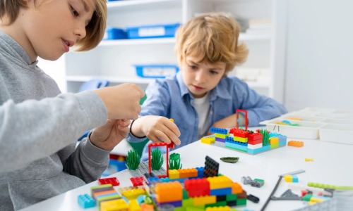 Children play with lego
