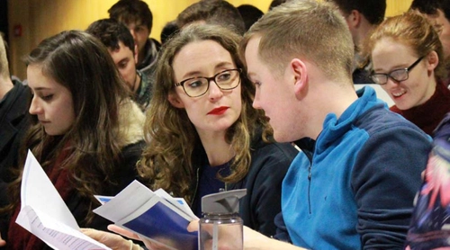 Image of two Physics students in conversation