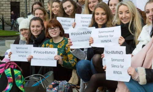Students holding cards image