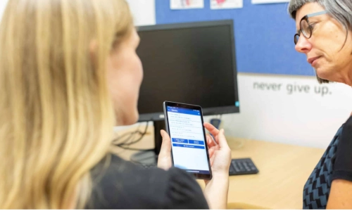 Medical person discussing things with patient