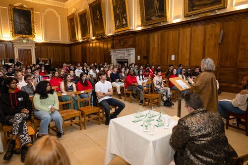 S2S Volunteer Awards 2025. S2S Volunteers are sitting in assembly listening to Provost Linda Doyle.