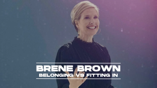 Brené Brown smiling while presenting. Text on screen reads “Brené Brown: Belonging vs Fitting In.” Link to a video discussing the difference between belonging and fitting in.