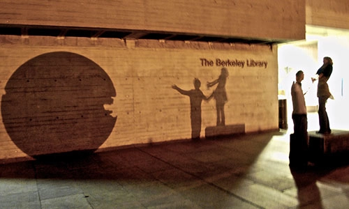 Silhouettes on the wall of the Berkeley library