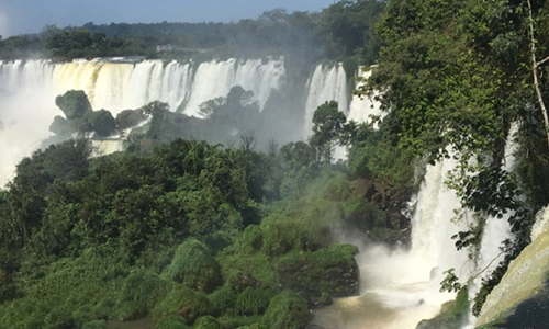 Image of a landmark waterfall in Latin America. A view of a cliff with just kilometers of water falling in the distance.