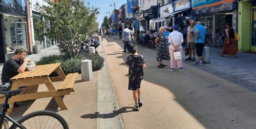 People meeting on the street of a town