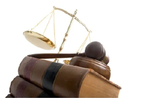 scales, law book and gavel