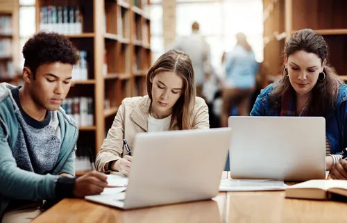 Three Student in Library