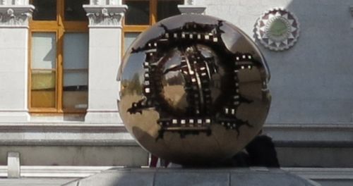 Pomodoro beside Museum Building