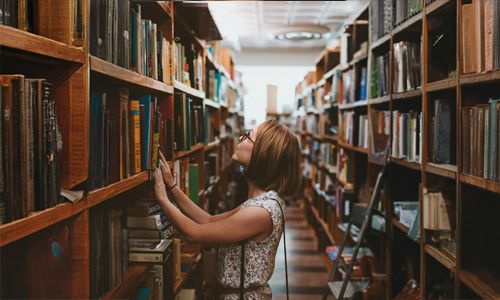 Student searching for book