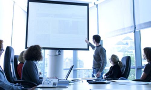 Lecturer using white screen