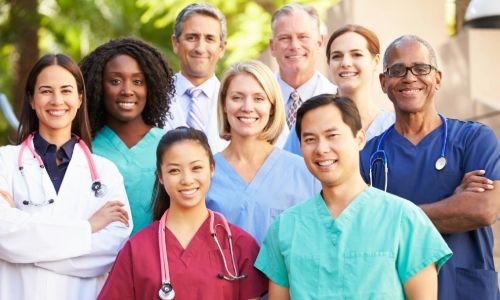 A group of nine healthcare professionals