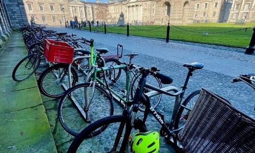 A row of locked bikes on the Trinity Campus