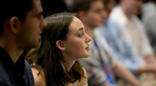 Dual BA students paying attention in a lecture.