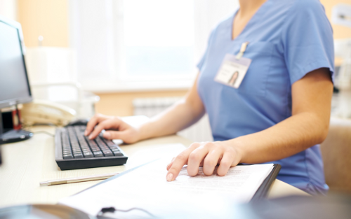 Nurse using computer