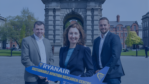 Three people from industry and academia holding a Ryanair sign to mark a new collaboration