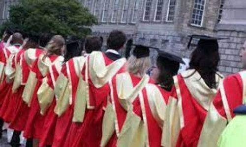 PhD students on their graduation day having a group photo taken