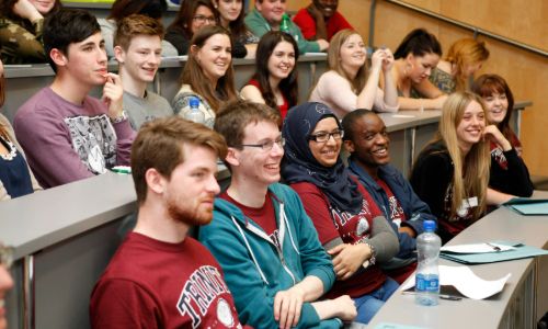 Students sitting in a lecture theatre