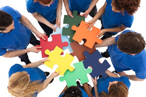 colourful jigsaw pieces fitting together