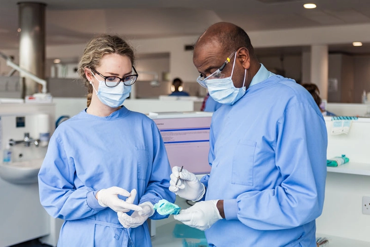 Two researchers at the Dental School