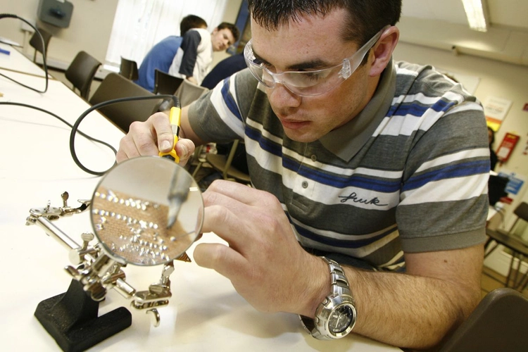 Student working in lab, Trinity College Dublin.