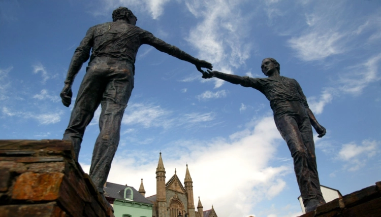 Hands across the divide sculpture