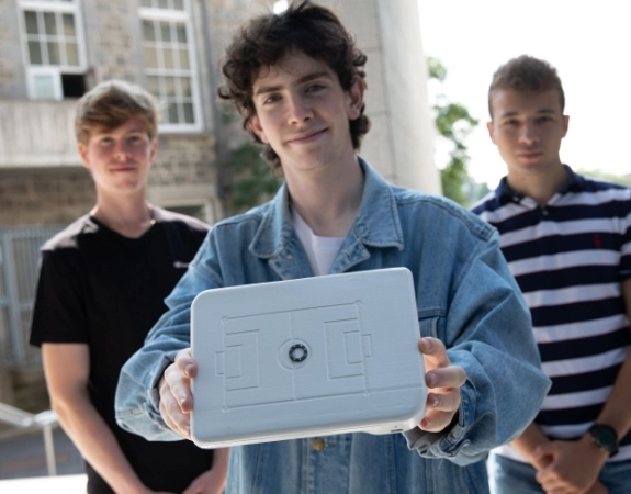 3 young men with their product developed via Launchbox