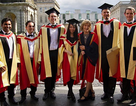 Postgraduate students at graduation ceremony.