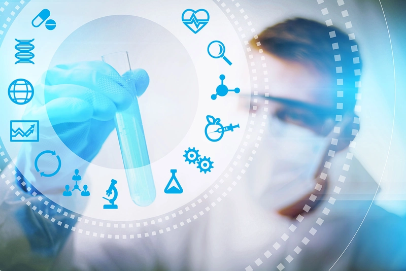 Medicine student holding a test tube with overlay logo's