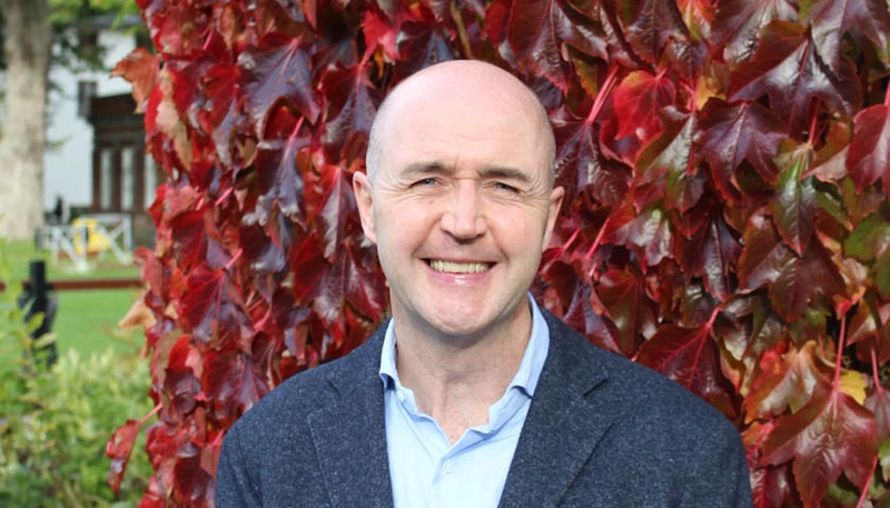 A photo of Dr. Nigel Carroll
