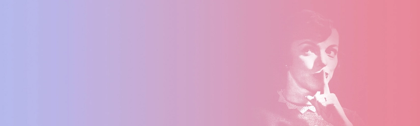 A woman whispering with her finger over her mouth