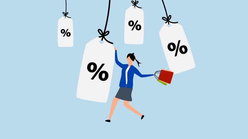 A person holding shopping bags and tags