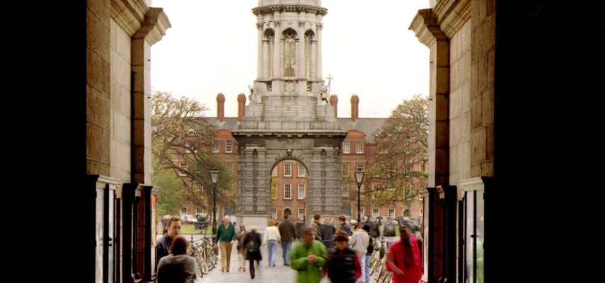 View of Trinity's Campanile and people walking in Front Square.