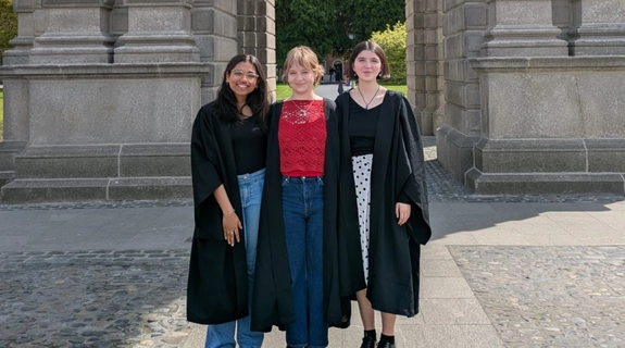 A group of three Trinity students on Trinity Monday.